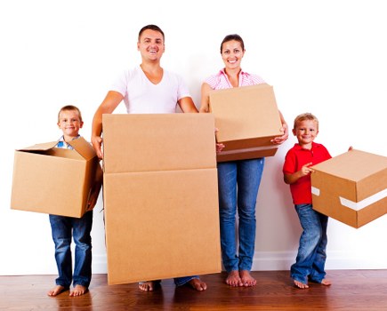 Business relocation setup with labelled boxes and office furniture placement