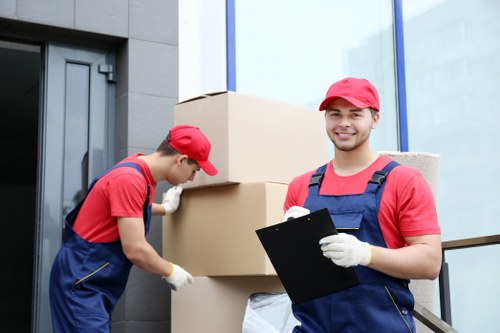 Van moving service with trained staff handling boxes safely