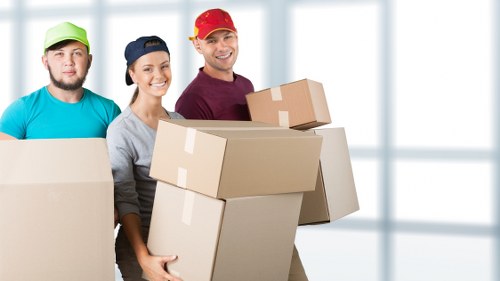 Protective wrapping and moving equipment used for piano removals in Merton