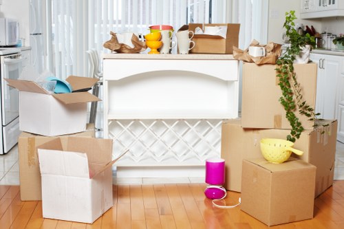 Careful loading of furniture and boxes for a house move in Merton