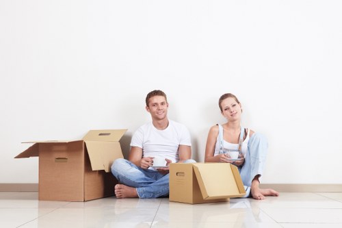 Packed boxes and furniture loaded into a removal van for a Merton move