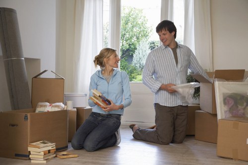 Careful loading of student furniture and boxes for a move in Merton