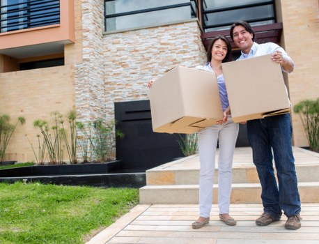 Student removals team handling a flat move in a Merton apartment building