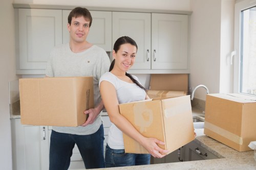 Local movers unloading student items at a Merton property